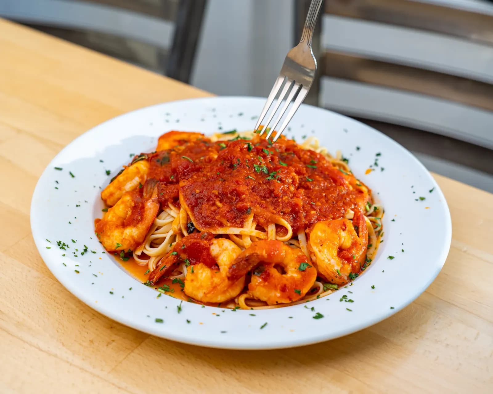 Shrimp fra diavolo over linguine in spicy marinara