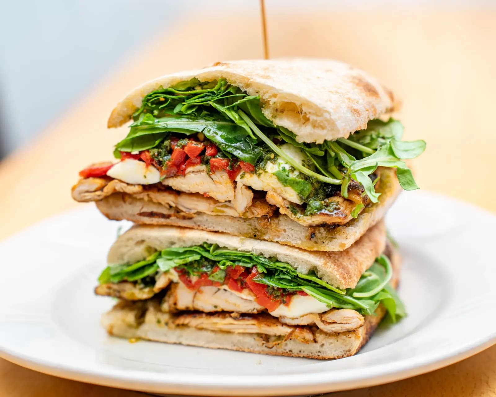 Panini Ala Italia with grilled chicken, roasted peppers and arugula