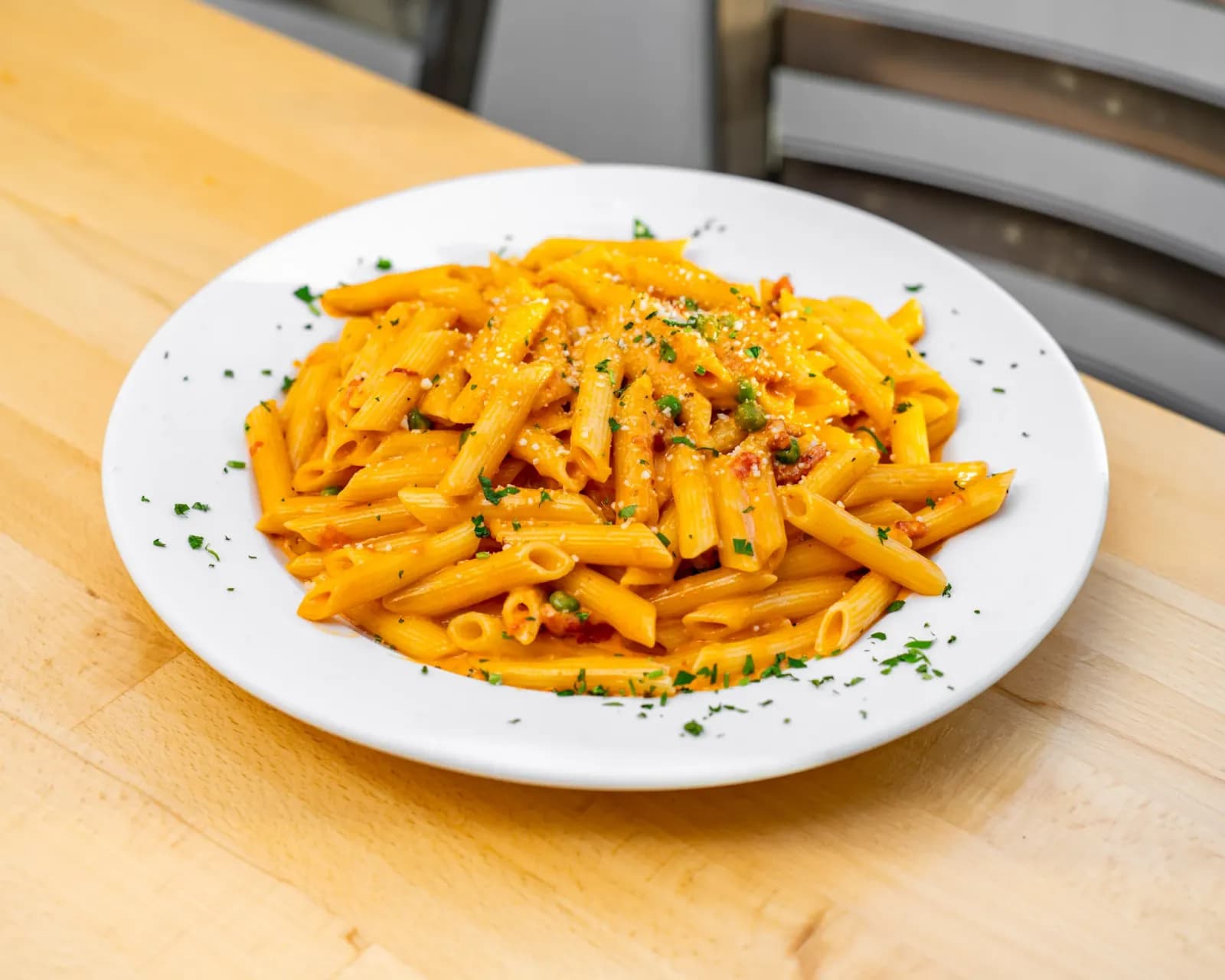 Plate of penne vodka in pink cream sauce